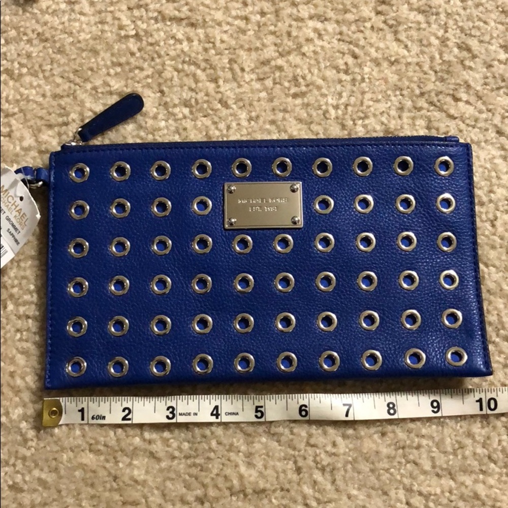 MICHAEL KORS JET SET GROMMET CLUTCH NWT